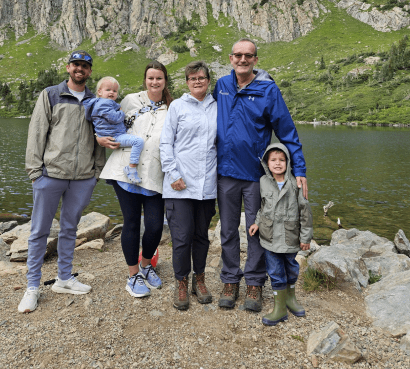 testimonial Chantz Williamson form Dreamcatcher Dairy with is family in front of a lake